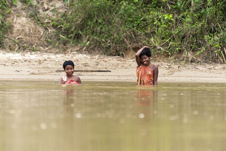Two Orangasli girls swimming