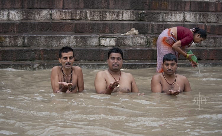India Varanasi men washing