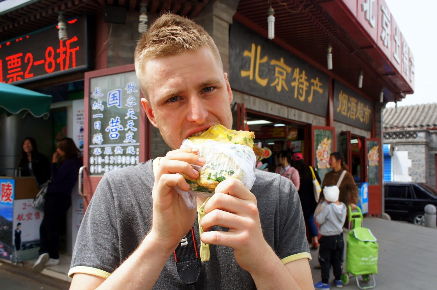 Cez eating Beijing street desserts