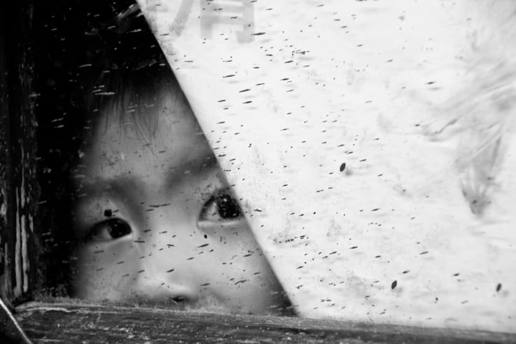 boy window hutong beijing