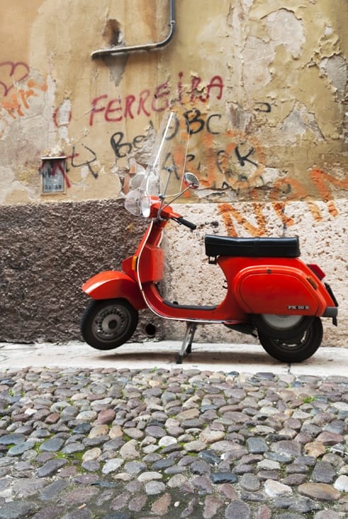 red vespa cobbled street