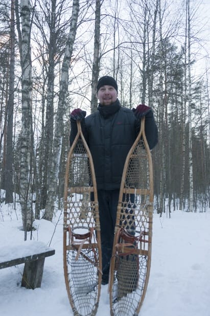 Host from Okkolan Lomamokit with traditional snow shoes