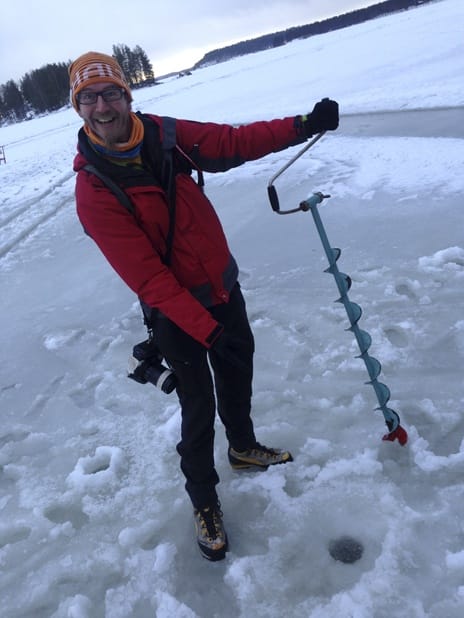 drilling holes frozen lake mikkeli finland