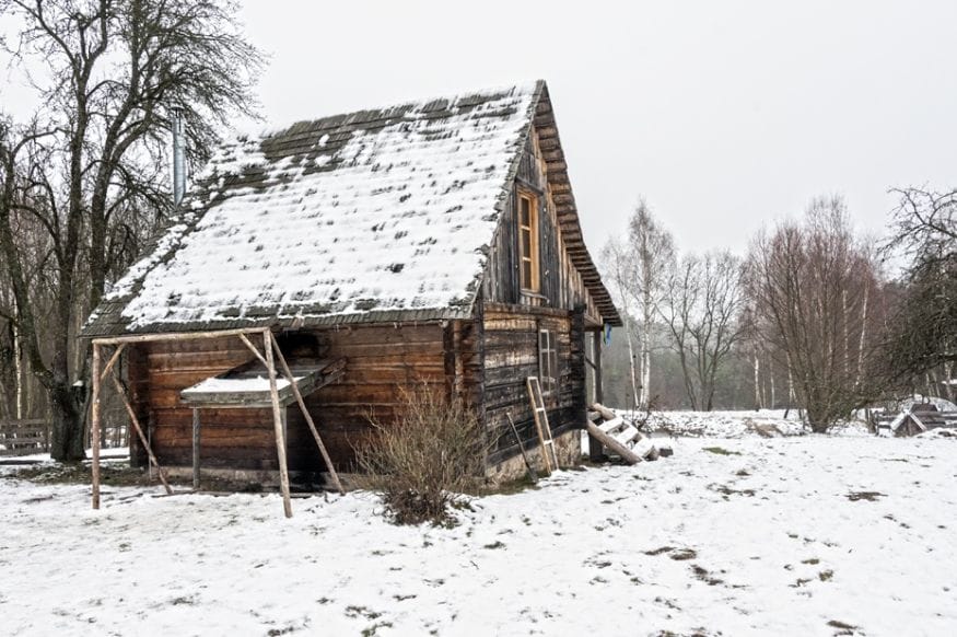 wooden home snow lithuania