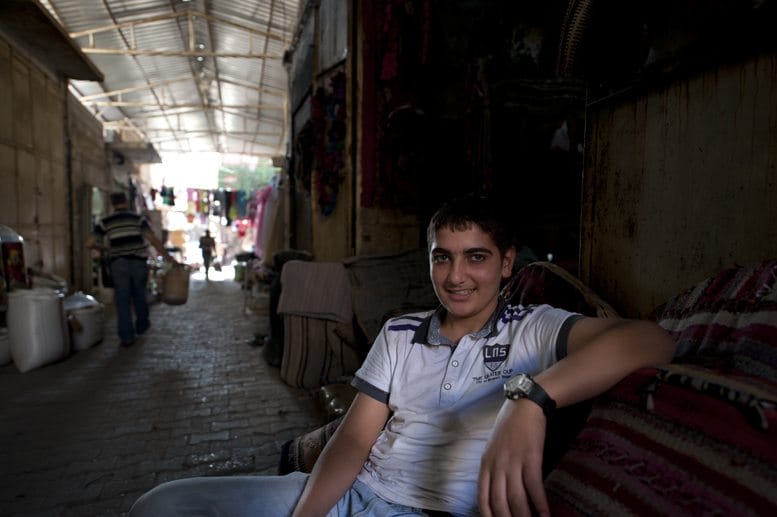 boy in souk silk road travel