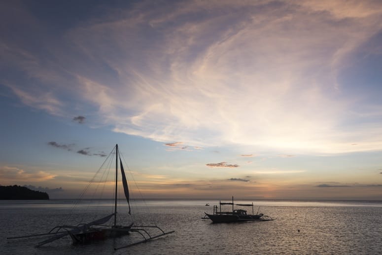 danjugan island boat cloud sunset