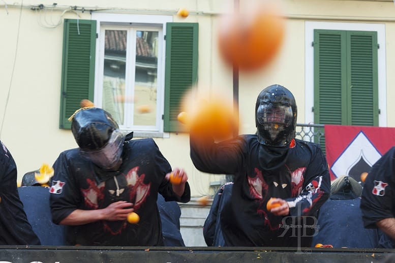 ivrea carnival oranges flying