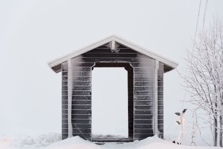 small cabin in snow finland