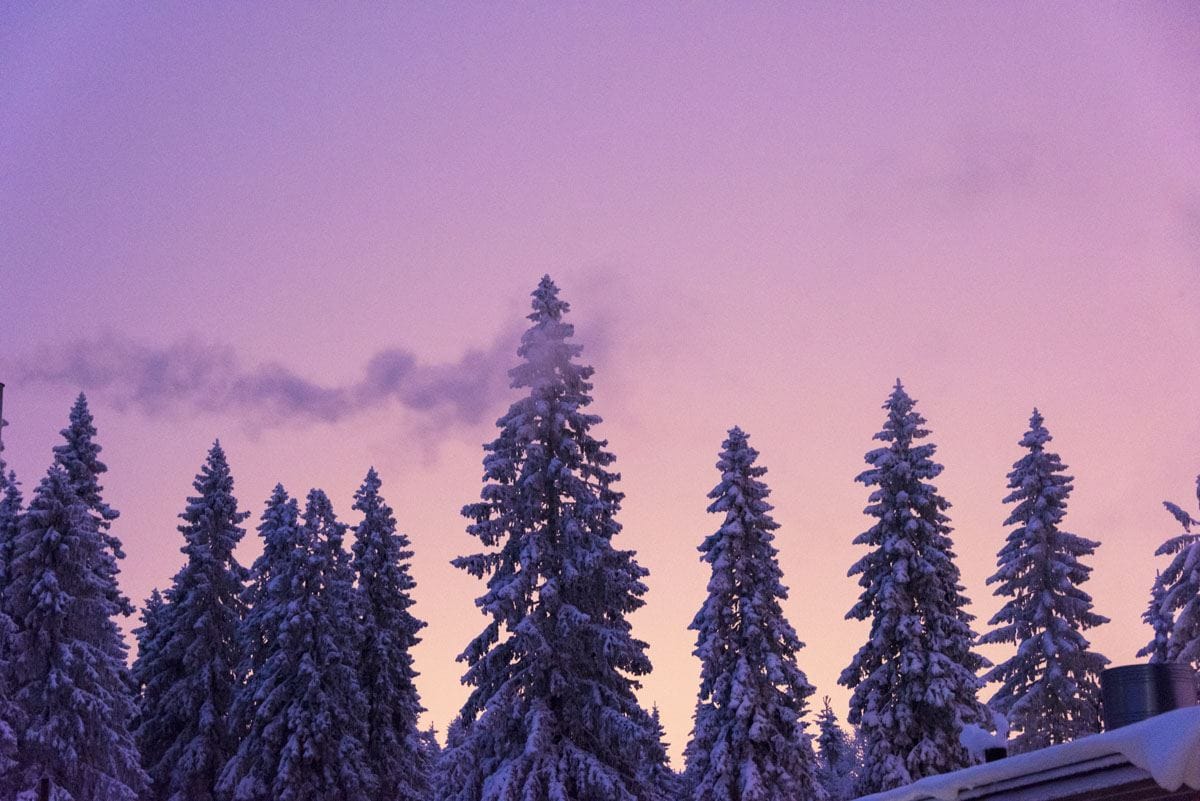 skiing in finland purple sky