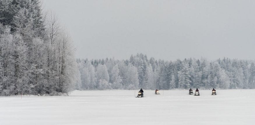 frozen lake finland snowmobile