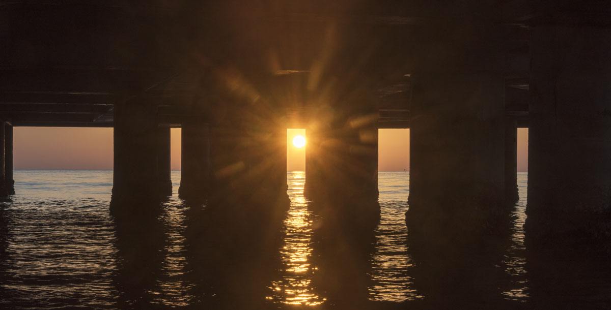 under rotonda senigallia sunrise