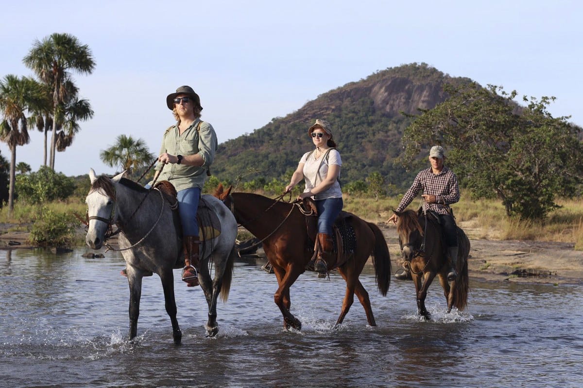 horse riding across river guyana