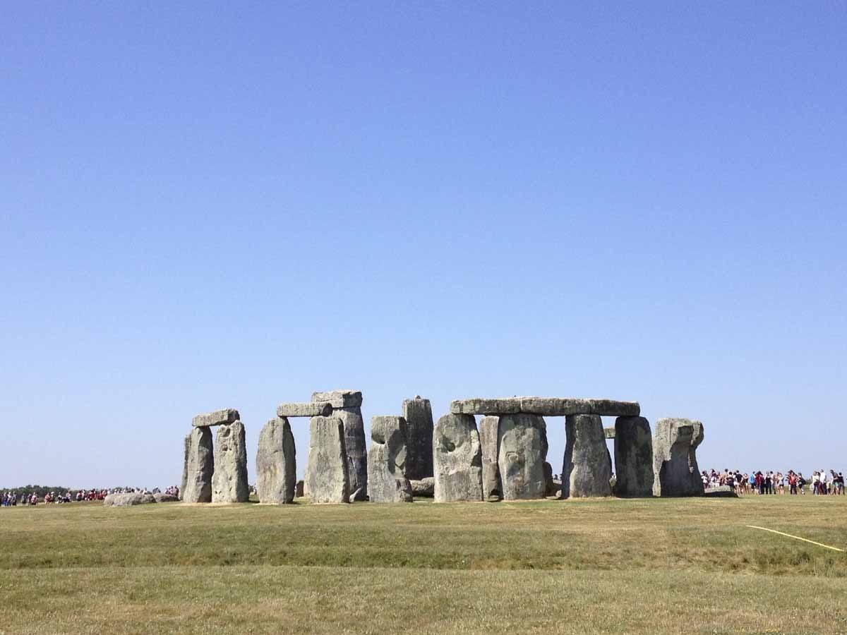 visit stonehenge blue sky