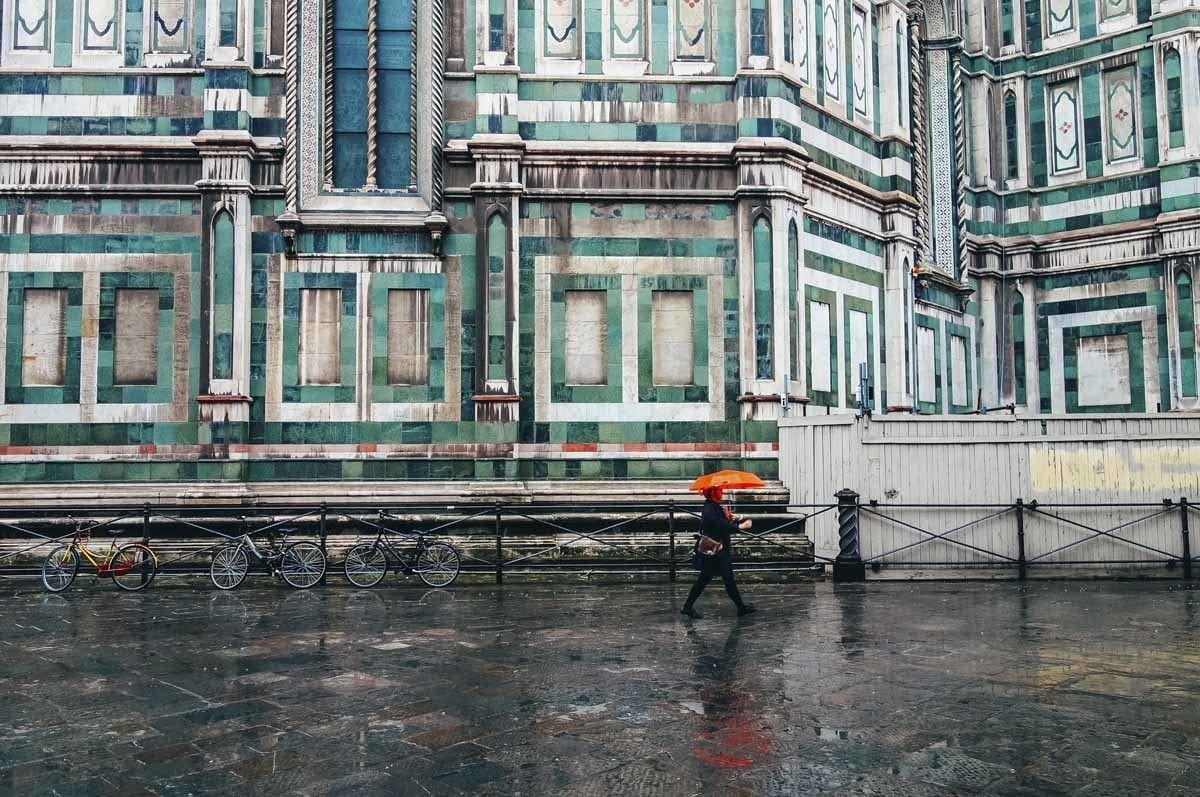 man walking by duomo florence