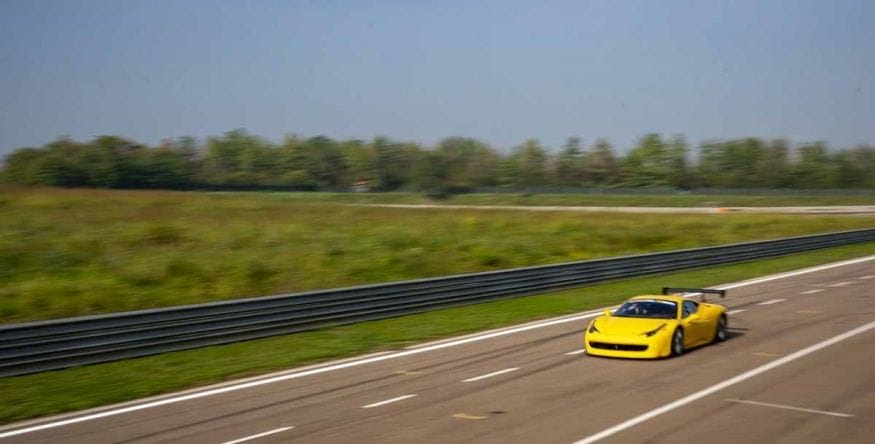 yellow ferrari 458 race track
