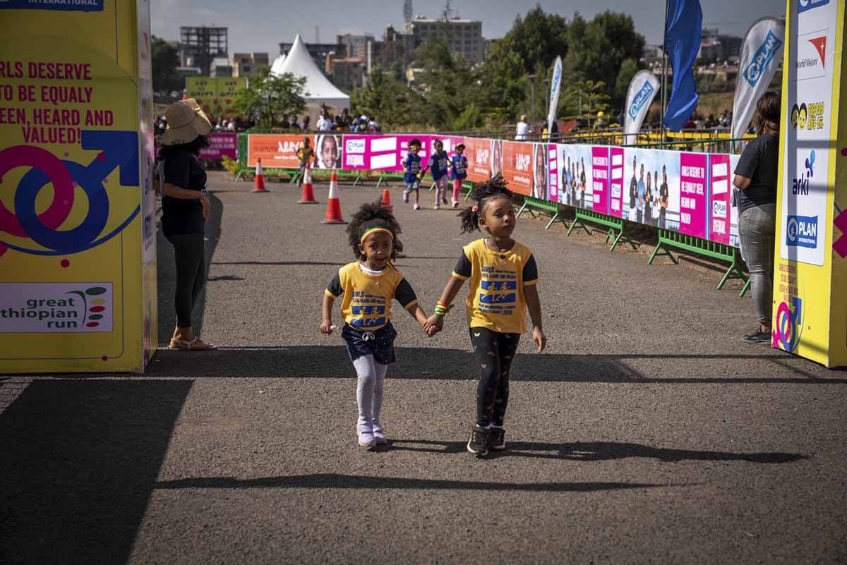 great ethiopian run children twi girls holding hands